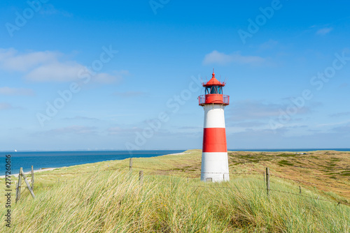 Lighthouse red white on dune. Sylt island – North Germany.  