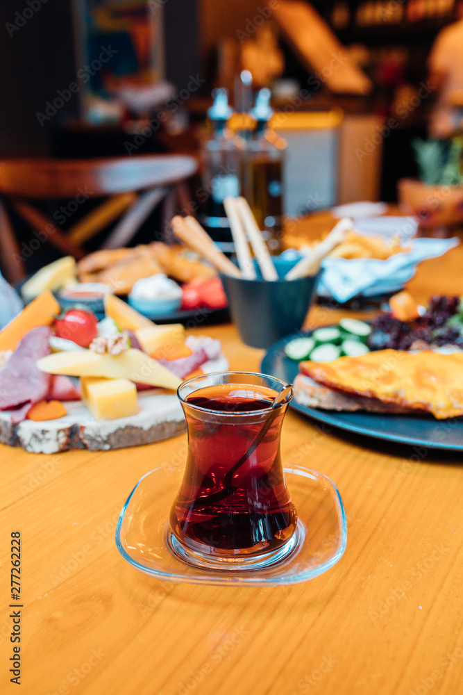 Turkish tea and Breakfast on the table at the restaurant or cafe in Turkey.