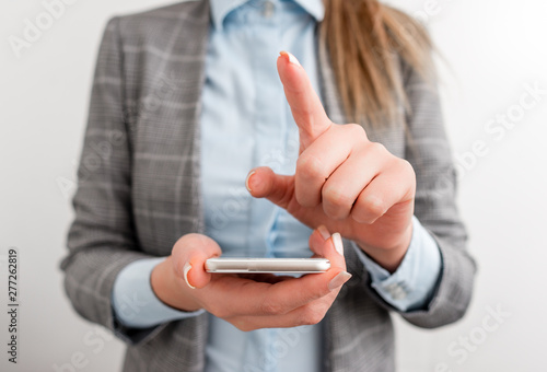 Business concept with mobile phone and business woman.