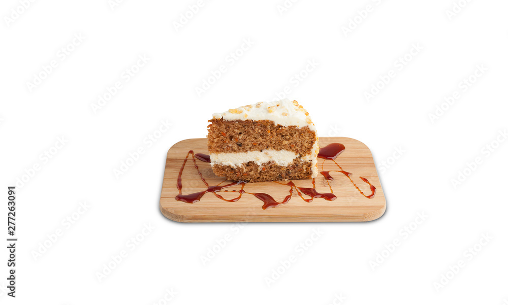 Carrot cake on a wooden board isolated on a white background Carrot cake on a wooden board isolated on a white background