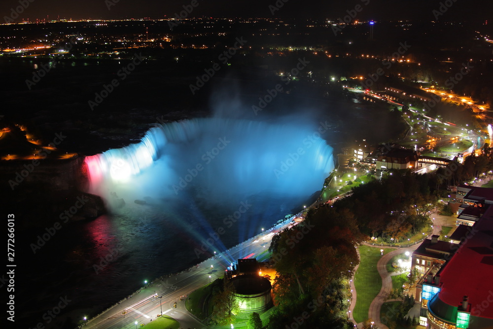Aerial view of Niagara falls illuminated at night