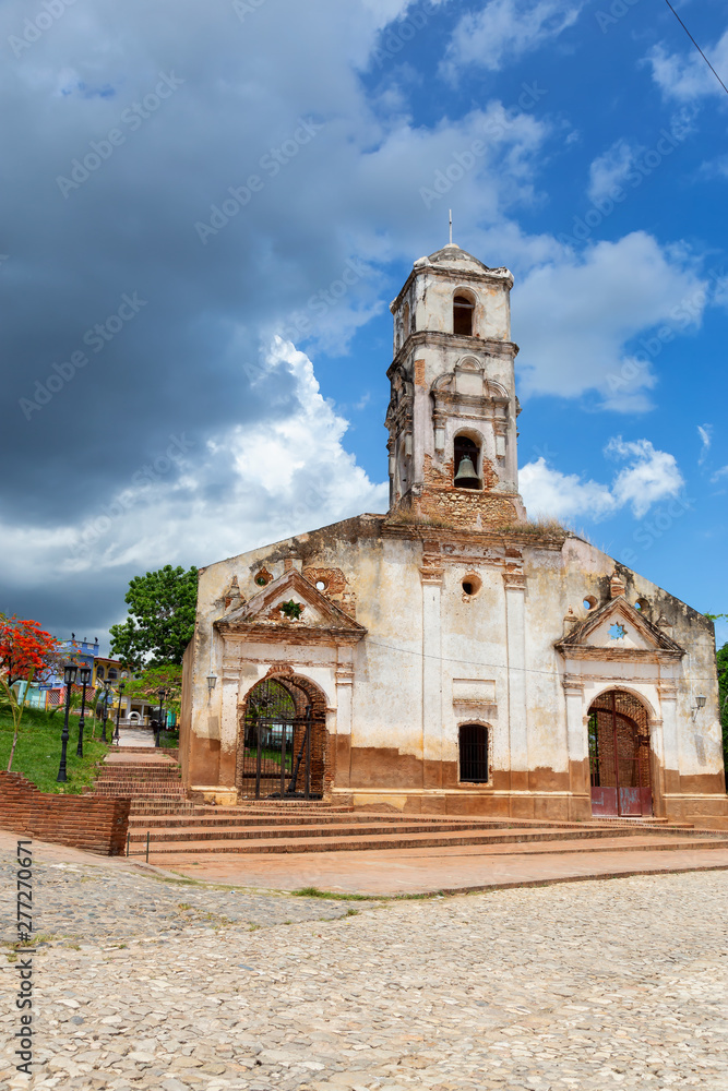Church in a small touristic Cuban Town during a vibrant sunny day. Taken in Trinidad, Cuba.