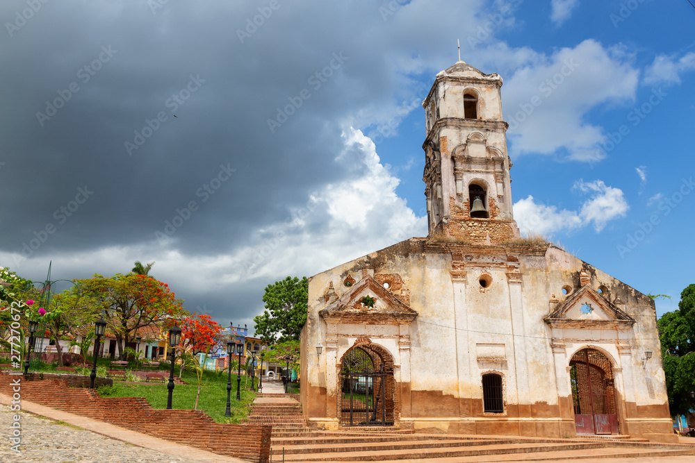 Church in a small touristic Cuban Town during a vibrant sunny day. Taken in Trinidad, Cuba.