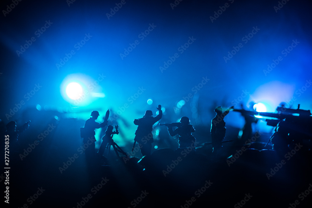 War Concept. Military silhouettes fighting scene on war fog sky background,