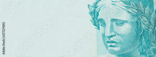 Republic's Effigy portrayed as a bust on Brazilian money. Concept of economy, inflation and business. Space for text.