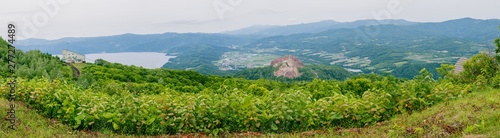 Panorama view from Viewpoint on Usu mountain at Hokkaido  Japan. This place include Showa Shinzan mountain and part of Lake Toya in cloudy day.