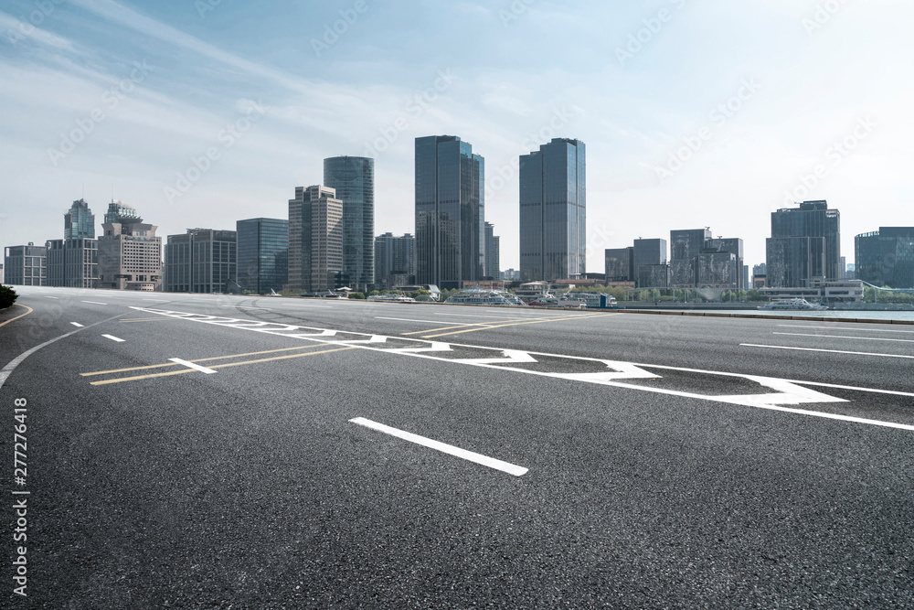 Fototapeta premium Empty Asphalt Road Through Modern City of Shanghai, China..