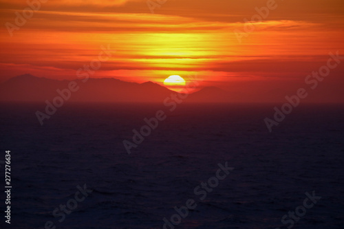 Fototapeta Naklejka Na Ścianę i Meble -  Sunset into the Alaskan Hills and Ocean