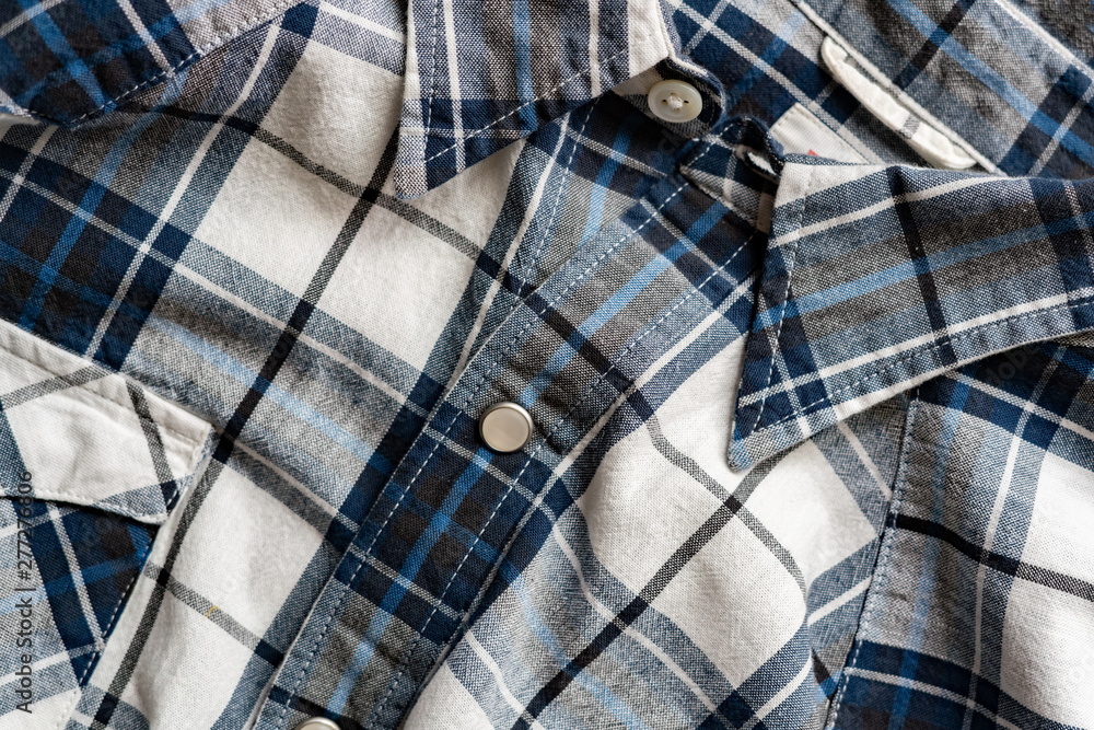 close up detail pattern of checkered men’s shirt close up detail pattern of checkered men’s shirt