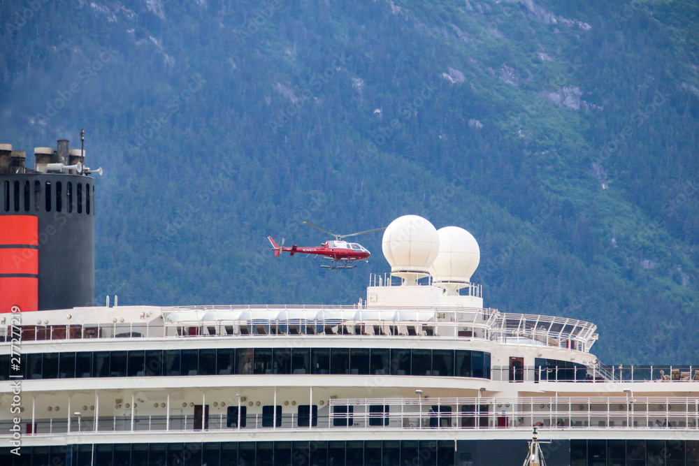 Helicopter over Cruise Boat