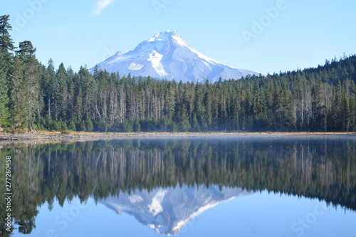 Pristine reflections of Mt Hood on Frog Lake in the Pacific Northwest on a perfect blue sky day
