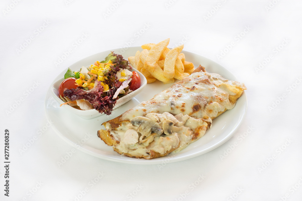 Baked crepes roll with chicken, cheese, mushroom and bechamel sauce