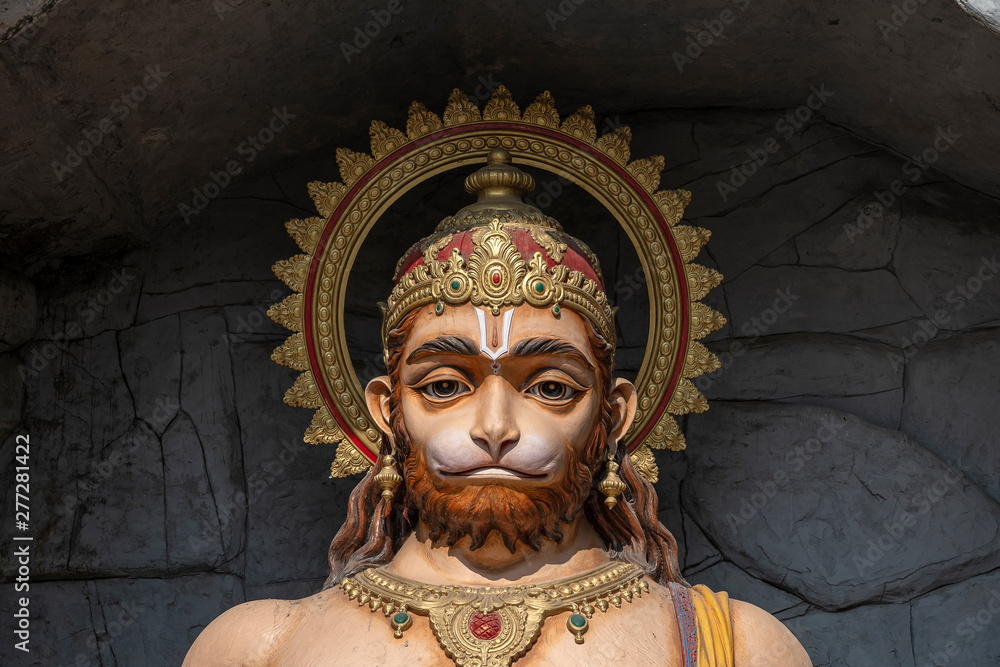 Hanuman statue, Hindu idol near Ganges River, Rishikesh, India. Sacred places for pilgrims