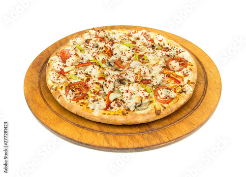 Delicious, fresh and tasty italian chicken pizza isolated on white. View of chicken pizza in restaurant at napoli. Pizza on wooden pizza board or plate from top view.
