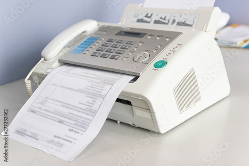 The fax machine for Sending documents in the office concept equipment needed in office
