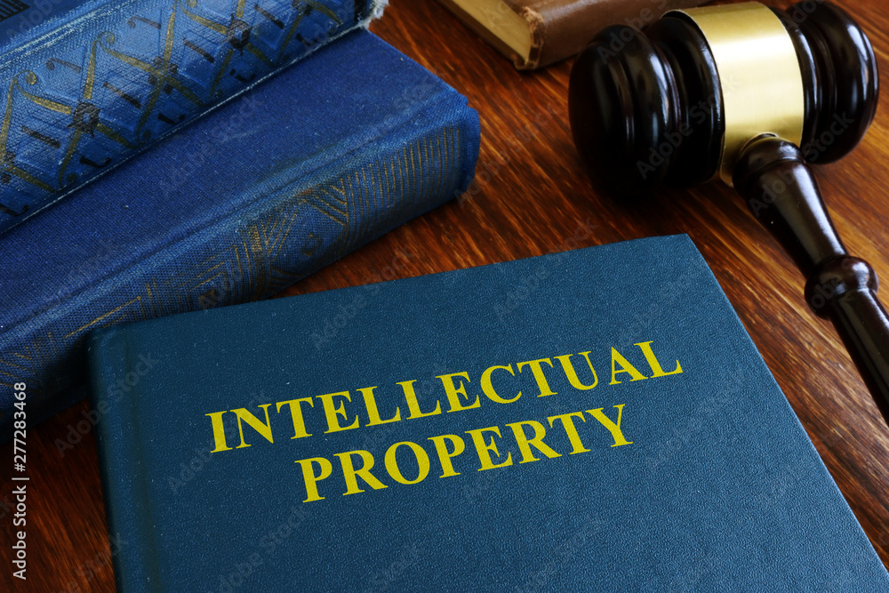 Intellectual property law about copyright on desk. Intellectual property law about copyright on desk.