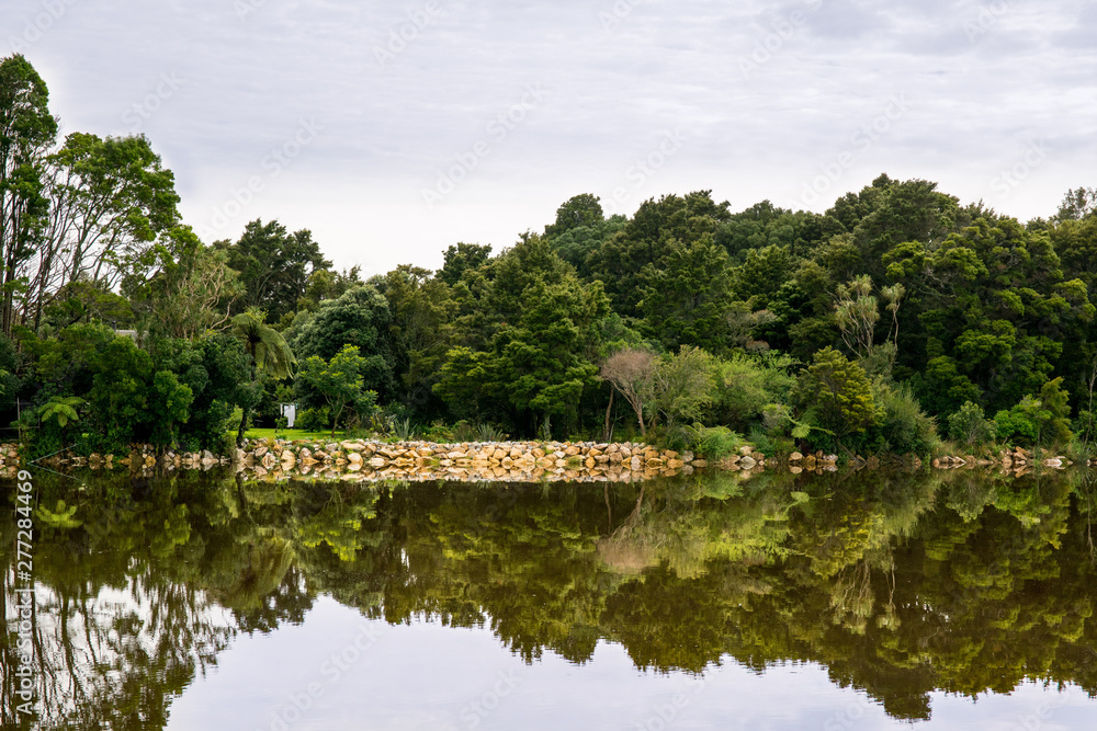 Dramatic mountain reflections on a very calm lake Dramatic mountain reflections on a very calm lake