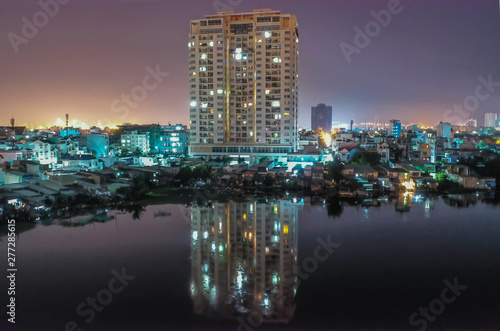 High Rise apartments and reflections,Midnight Drone Flight Photo Suburban Ho Chi Minh City © Paul