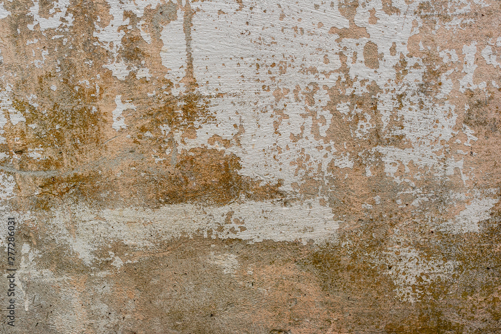 Texture of a concrete wall with cracks and scratches which can be used as a background Texture of a concrete wall with cracks and scratches which can be used as a background