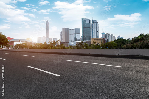 Road and skyline of urban architecture..