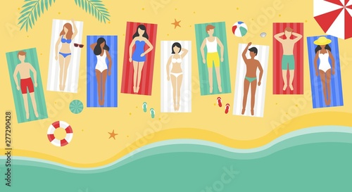 Summer Holiday, People on beach mat at the beach