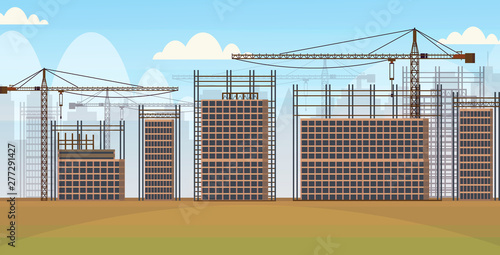 building construction site with cranes unfinished residential area buildings cityscape background flat horizontal