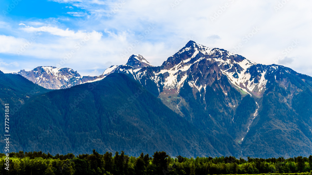The pyramid shaped Cheam Mountain, or Cheam Peak, towering over the Fraser Valley as seen from the Lougheed Highway near Agassiz, British Columbia, Canada