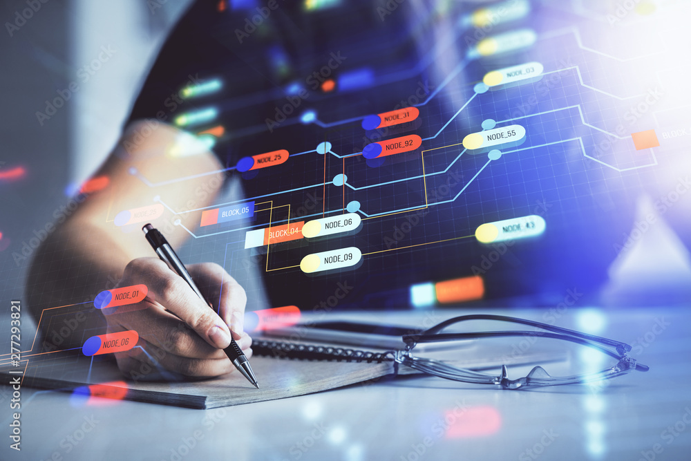 Multi exposure of woman's writing hand on background with data technology hud. Concept of innovation. Multi exposure of woman's writing hand on background with data technology hud. Concept of innovation.