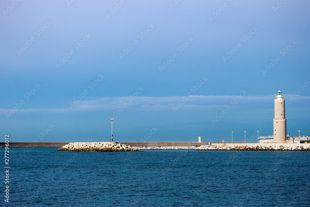 Livorno lighthouse on the pier, at the south entrance of the Port of Livorno in Tuscany on the Ligurian Sea Livorno lighthouse on the pier, at the south entrance of the Port of Livorno in Tuscany on the Ligurian Sea