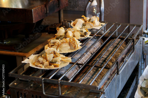 Japanese grilled scallops on charcoal