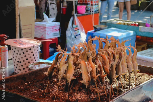 Skewered fried fish being sold in Japan