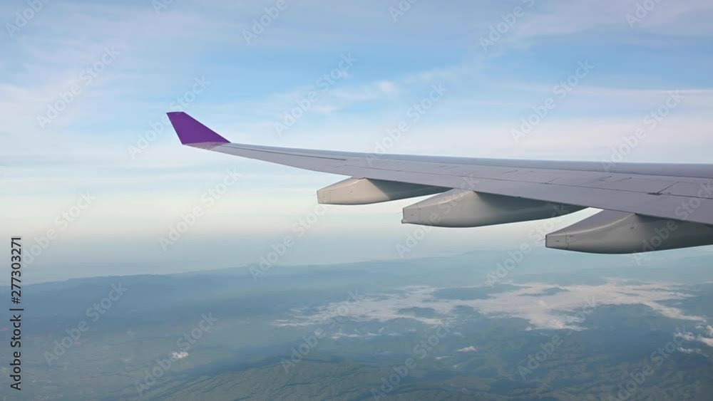 4K Beautiful airplane window view flying above Khao Sok national park 4K Beautiful airplane window view flying above Khao Sok national park
