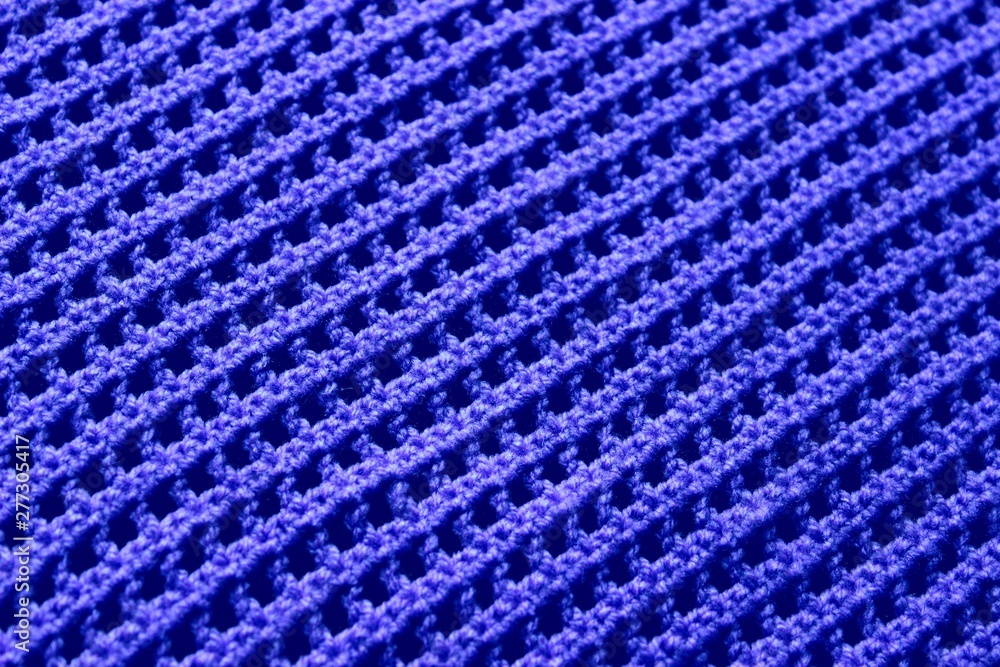 blue knitted texture in the form of squares