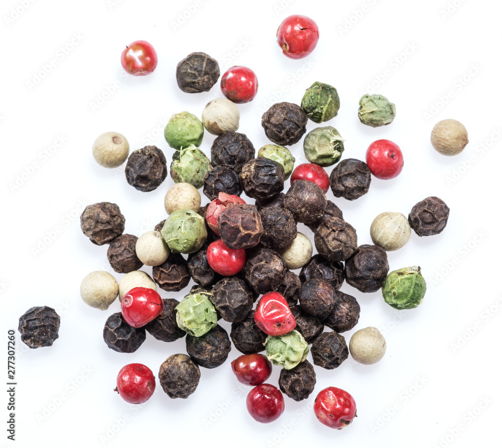 Black, white, green and red peppercorns isolated on white background. Black, white, green and red peppercorns isolated on white background.