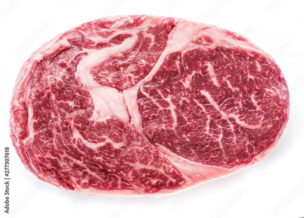 Fototapeta premium Raw Ribeye steak or beef steak isolated on white background.