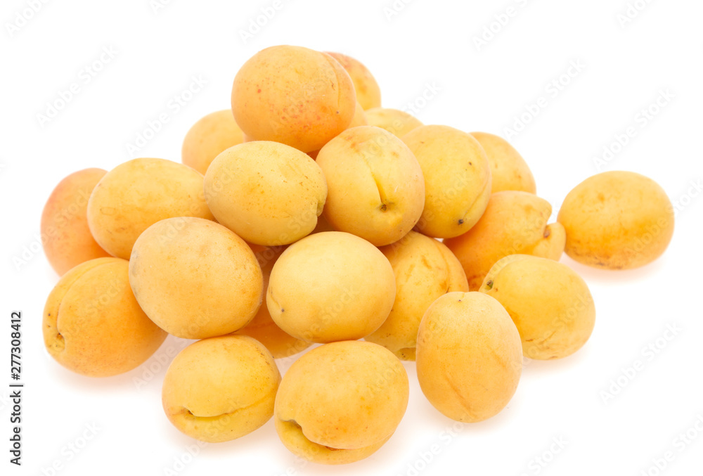 fresh yellow apricots against white background fresh yellow apricots against white background