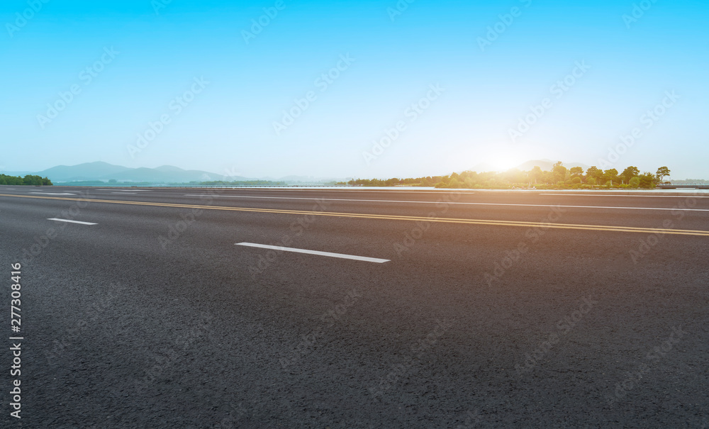 Naklejka premium Road Pavement and Outdoor Natural Landscape..