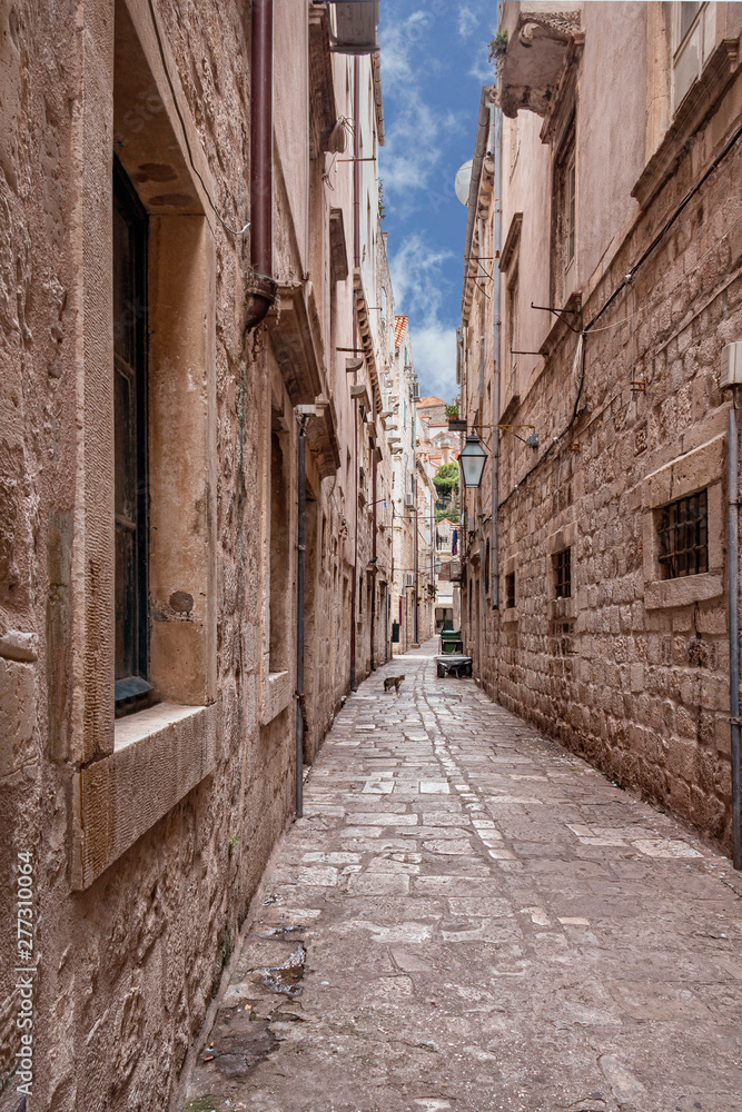 narrow cobblestone street in the old part of the Croatian city of Dubrovnik