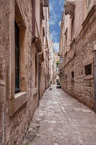 narrow cobblestone street in the old part of the Croatian city of Dubrovnik