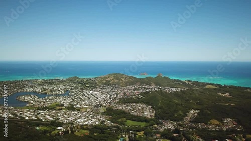 Drone Shot showing a Panoramic View of Kailua Town and the coastline with the Mokulua Islands in the distance. photo