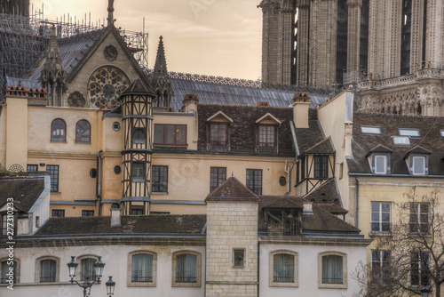 Fake medieval house in the center of Paris with in the background the Notre Dame cathedrala few weeks before the building was damaged by fire photo