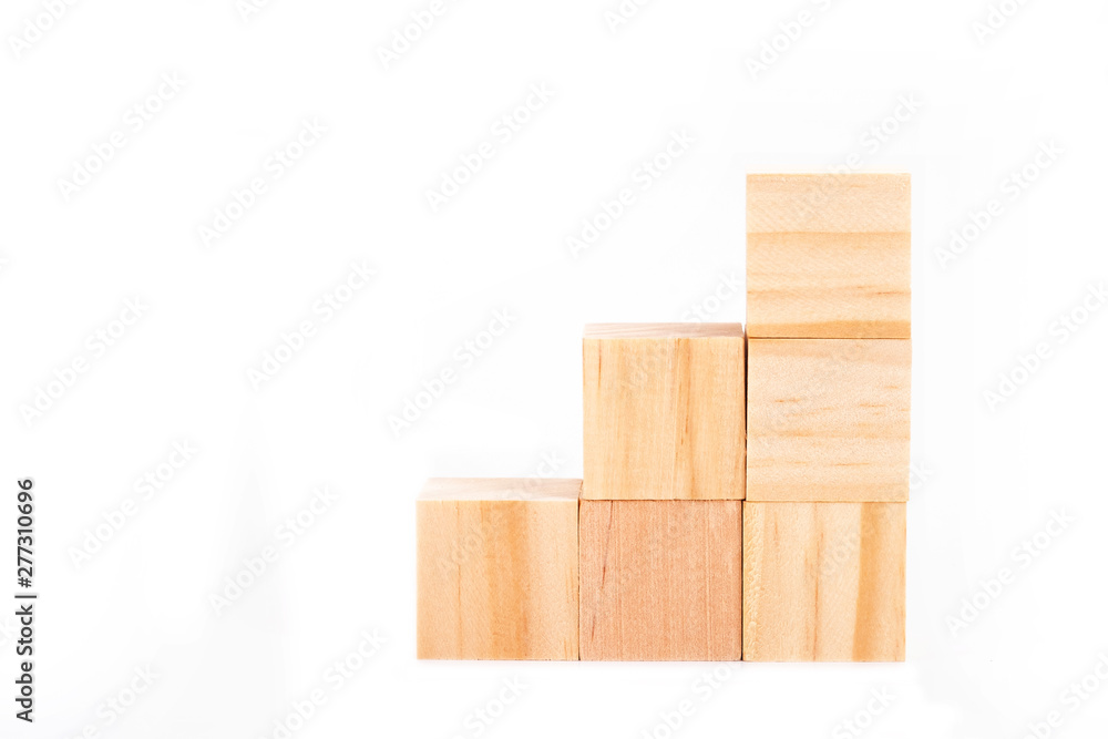 Obraz premium Blocks of wood isolated on white background. Strategy as a business plan for team work.