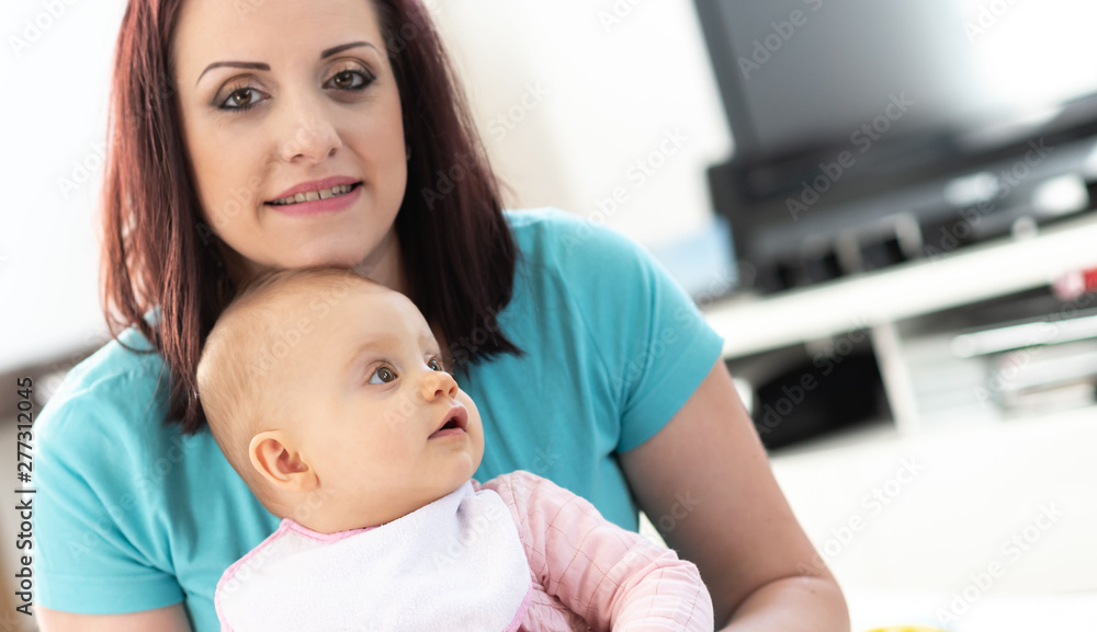 Portrait of mother with her cute baby girl Portrait of mother with her cute baby girl
