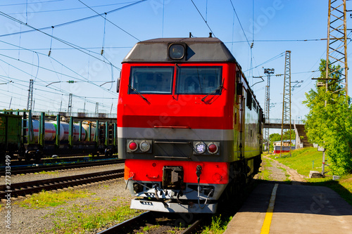 Summer.Locomotive goes on rails. Russian train. Russian railway.