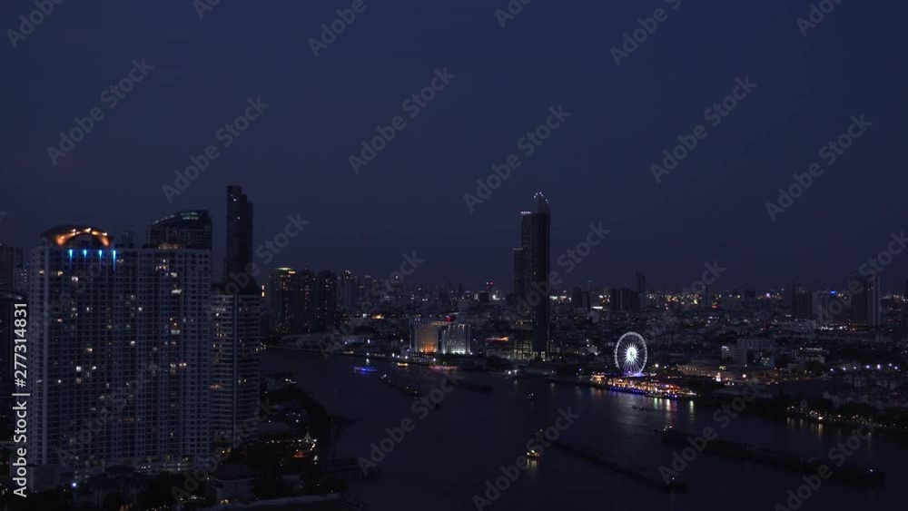 Panoramic view of Bangkok city skyline at night with ferris wheel, Thailand Panoramic view of Bangkok city skyline at night with ferris wheel, Thailand