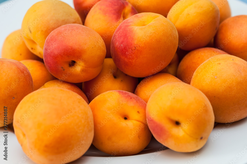 many fresh apricots top view many fresh apricots top view