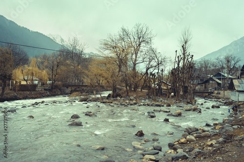 Beautiful landscape of the natural Liddar or Lidder river stream from the Himalayas mountain passing Laripora village Pahalgam is a popular tourist destination Kashmir,India photo