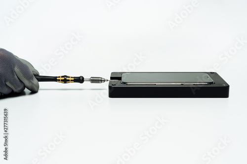 Wallpaper Mural Mobile Phone Broken Display Repair Screwdriver. Hand in Glove Fix Smartphone Crack Glass Cover to Maintenance Care Service. Cellphone Assembly Tool . Diagnosis Technology for Telephone Isolated Torontodigital.ca