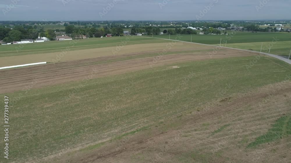 Aerial View of Amish Farmer Seeding His Field with 6 Horses Aerial View of Amish Farmer Seeding His Field with 6 Horses