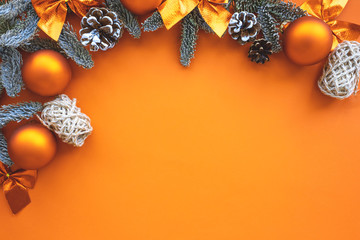 Christmas composition.  Background  orange colors with decorations. 